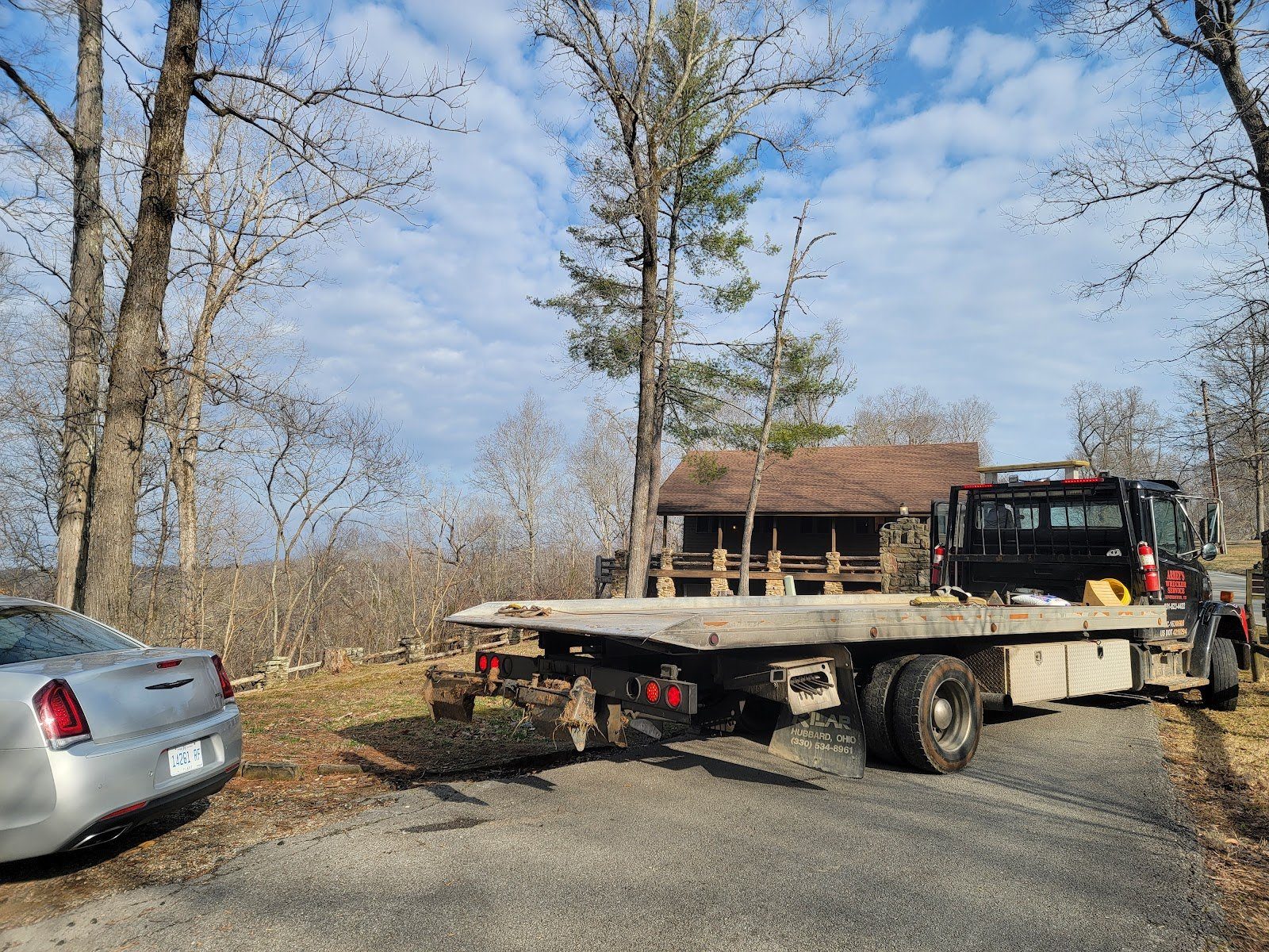 Arney's Wrecker Service rollback flatbed truck