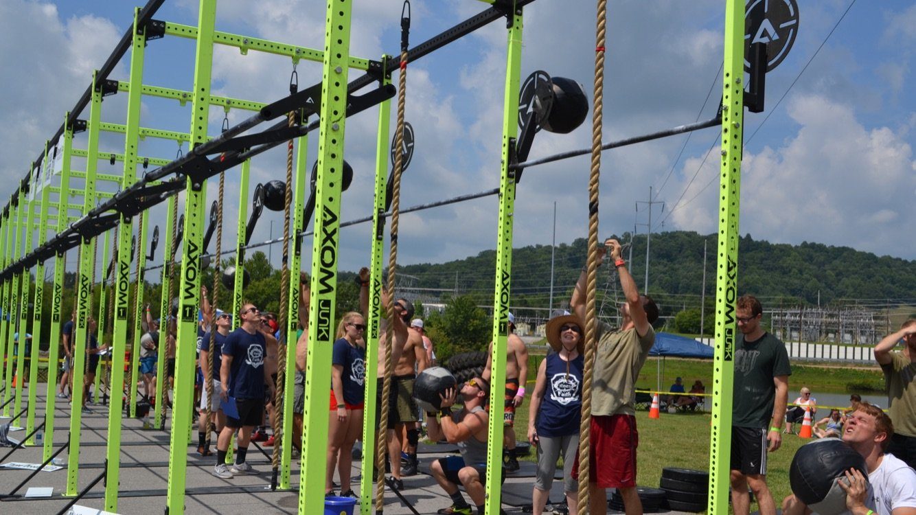 Members working out during a group class at Muscle Factory Group Fitness