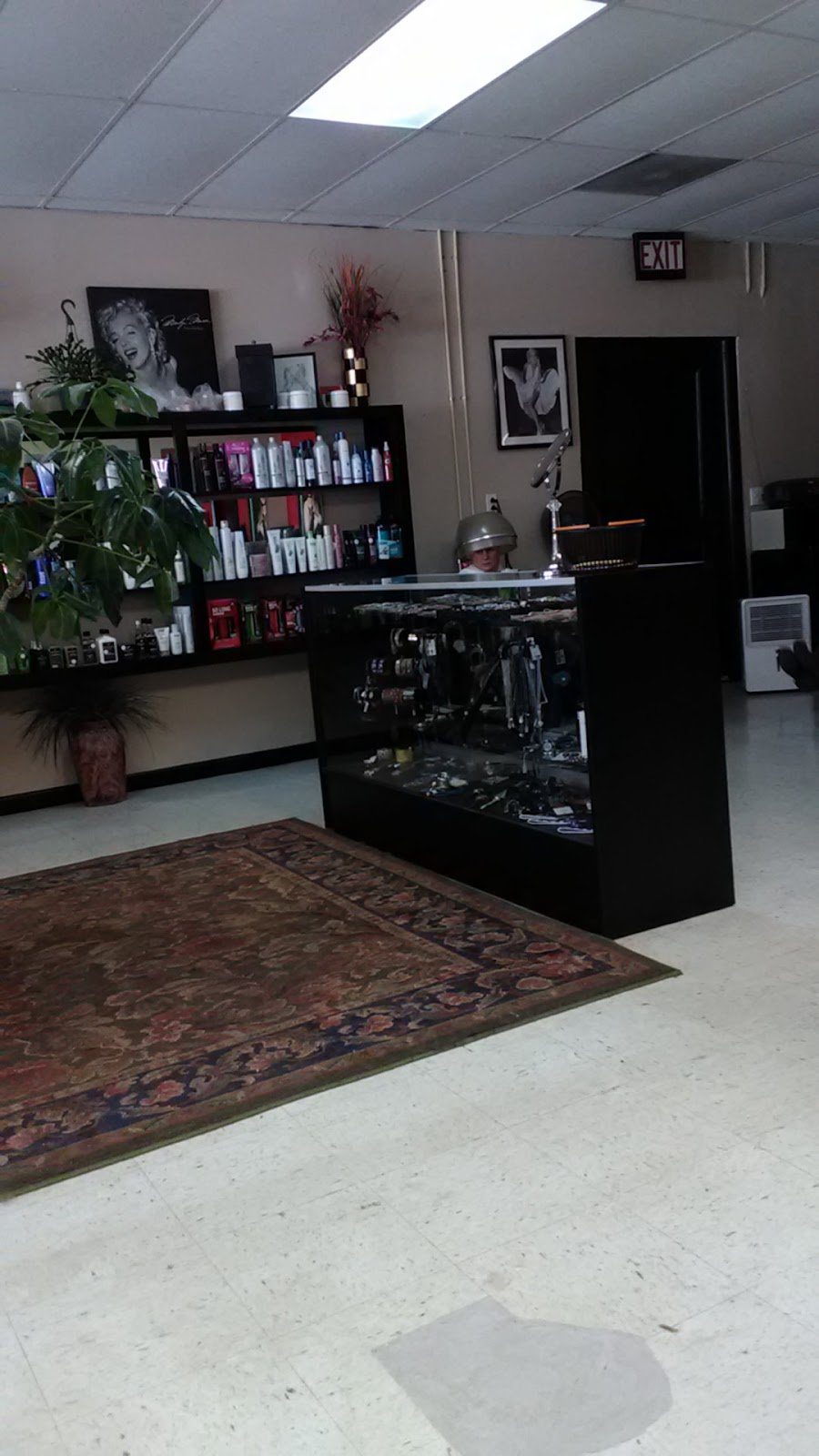 The reception area and retail shelf inside Pamie's Unisex Hair Salon