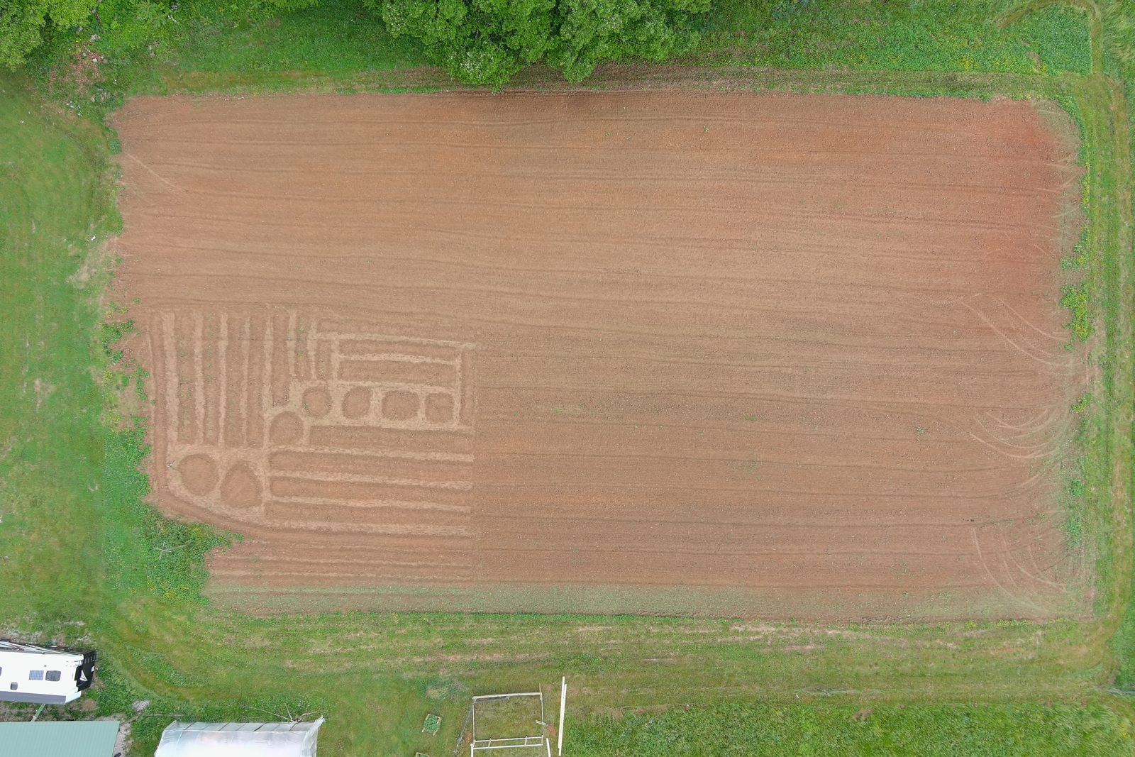 Top-down survey view of plotted fields and garden beds