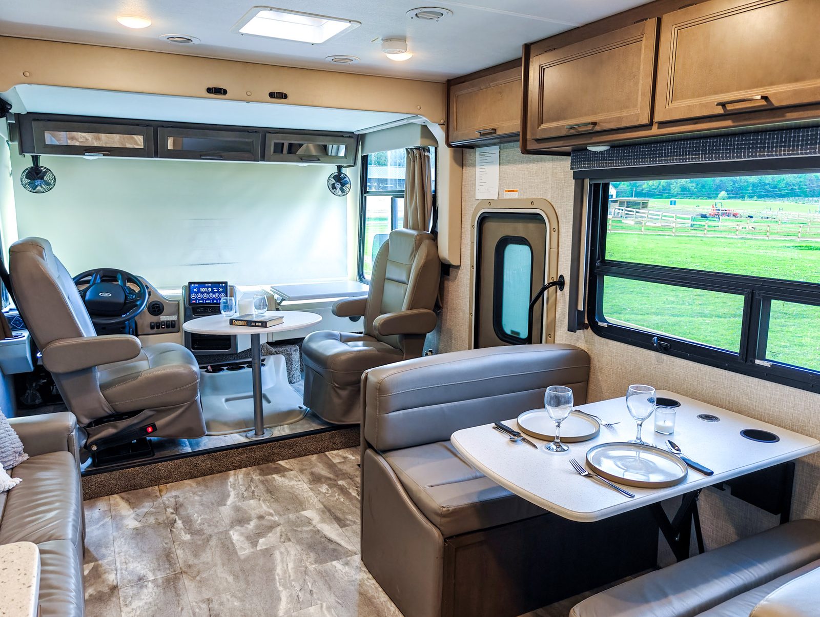 Fully set-up motorhome interior overlooking the pasture at Tapestry Acres